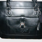 COACH Cartera en cuero mediana. Talla Única