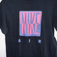 NIKE Camiseta básica estampada. Talla S