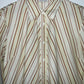 LELYS Blusa a rayas en diagonal. Talla M/L*