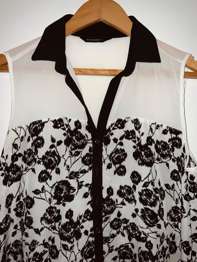 RAGGED Blusa con corte estampado. Talla L