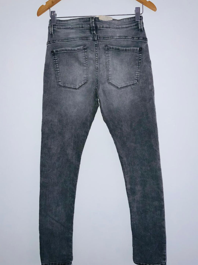 TENNIS Jean Cinco bolsillos junior  skinny en gris . Talla 16