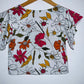 CAMISETA Corta estampada flores. Talla S*