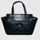 COACH Cartera en cuero mediana. Talla Única