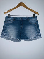 NAF NAF Short en indigo bordado. Talla 10