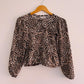 URB ( NUEVA ) Blusa animal print para niña. Talla 10