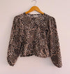 URB ( NUEVA ) Blusa animal print para niña. Talla 10