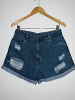 BIPOLAR Short en indigo con procesos de lavado. Talla 14