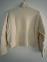 ZARA Sweater cuello tortuga crema. Talla S