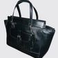 COACH Cartera en cuero mediana. Talla Única