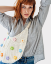 CARTERA ( NUEVA )  En crochet con aplicaciones. Talla Única
