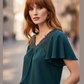 MANGO Blusa con aplicaciones en encaje. Talla S