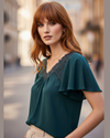 MANGO Blusa con aplicaciones en encaje. Talla S