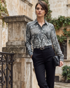 ARKITECT ( NUEVA ) Blusa camisera estampada hojas. Talla S