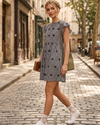 INA Vestido corto bordado ojalillo. Talla S