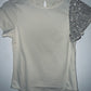 OFFCORSS Body crema con manga de lentejuelas plateadas. T14