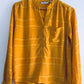 NAF NAF Blusa manga larga con textura. TS