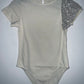 OFFCORSS Body crema con manga de lentejuelas plateadas. T14