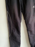 ADIDAS Pantalón deportivo para hombre con cortes. Talla L