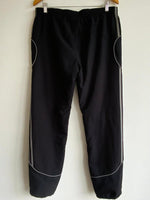 ADIDAS Pantalón deportivo para hombre con cortes. Talla L