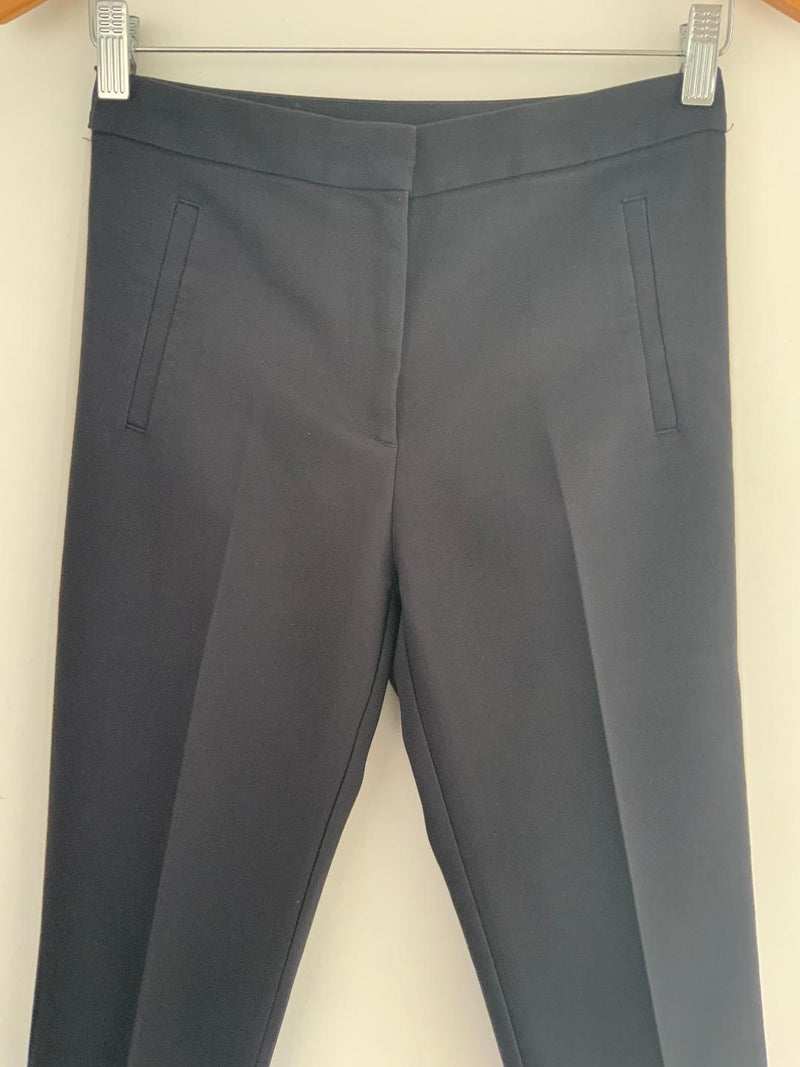 ZARA Pantalón negro con corte lateral en contraste. Talla S