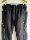 ADIDAS Pantalón deportivo para hombre con cortes. Talla L