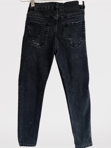 ZARA Jean para niña en denim oscuro con cortes en piernas. Talla 9