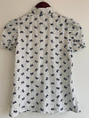 H&M Blusa camisera manga corta estampada moñitos. Talla 4